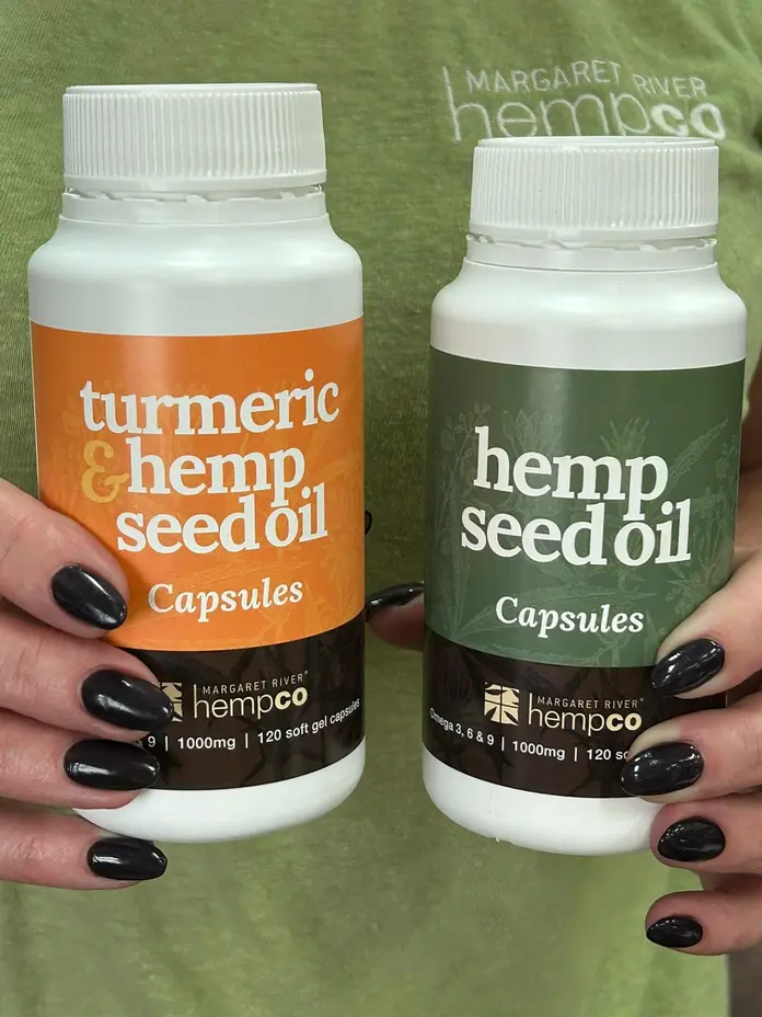 Two bottles of Margaret River Hemp Co turmeric and hemp seed oil capsules.